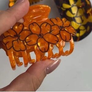 Puakenikeni cluster flower hair claw clip